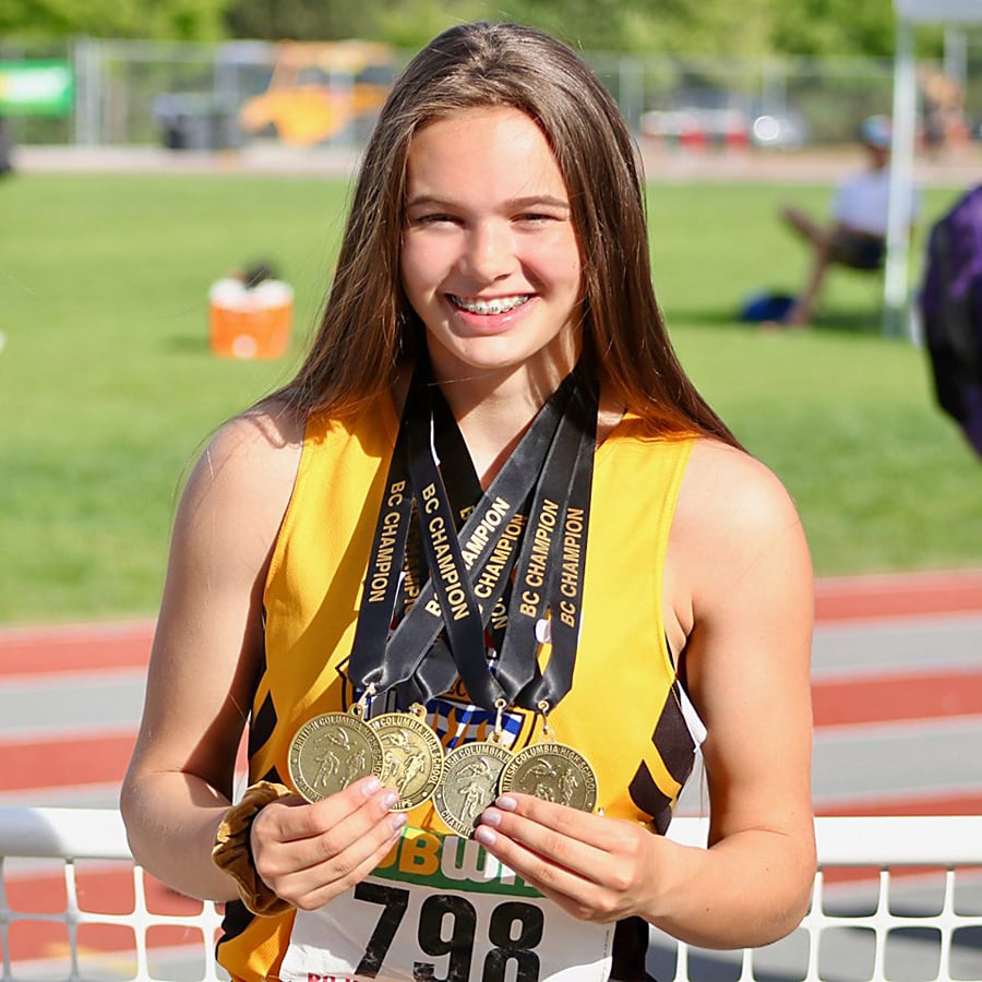 <who>Photo Credit: Contributed </who>Emma Cannan shows off her four gold medals at the insistence of family and friends.