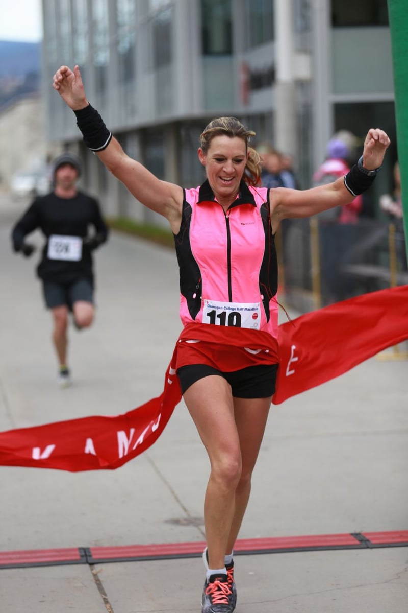 <who>Photo Credit: KelownaNow</who> Tracy Dayman claiming her first place title for the women's category with a time of 1:33