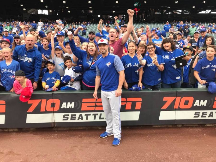 <who>Photo Credit: Toronto Blue Jays</who>Blue Jays outfielder Randal Grichuk poses with Jays fans in Seattle.