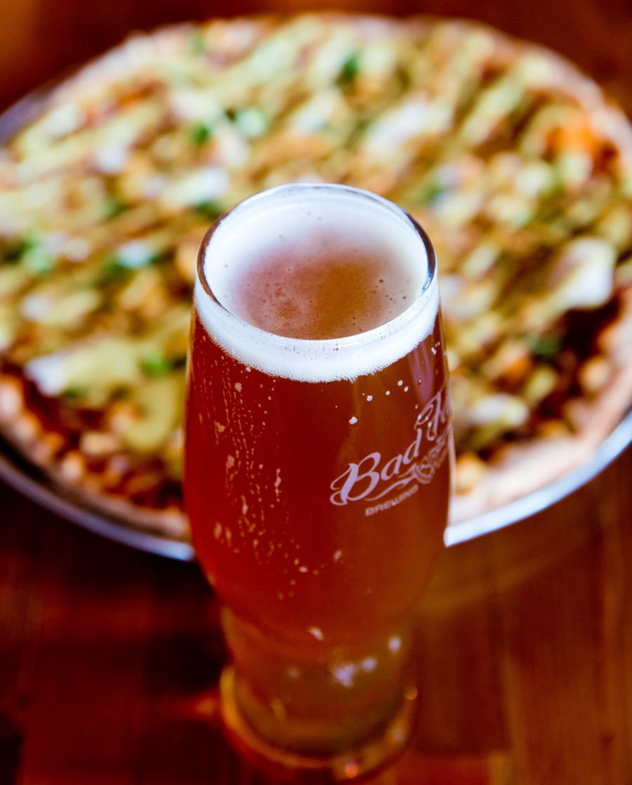 <who>Photo Credit: NowMedia</who> A beer and a pizza from Bad Tattoo is a Penticton staple