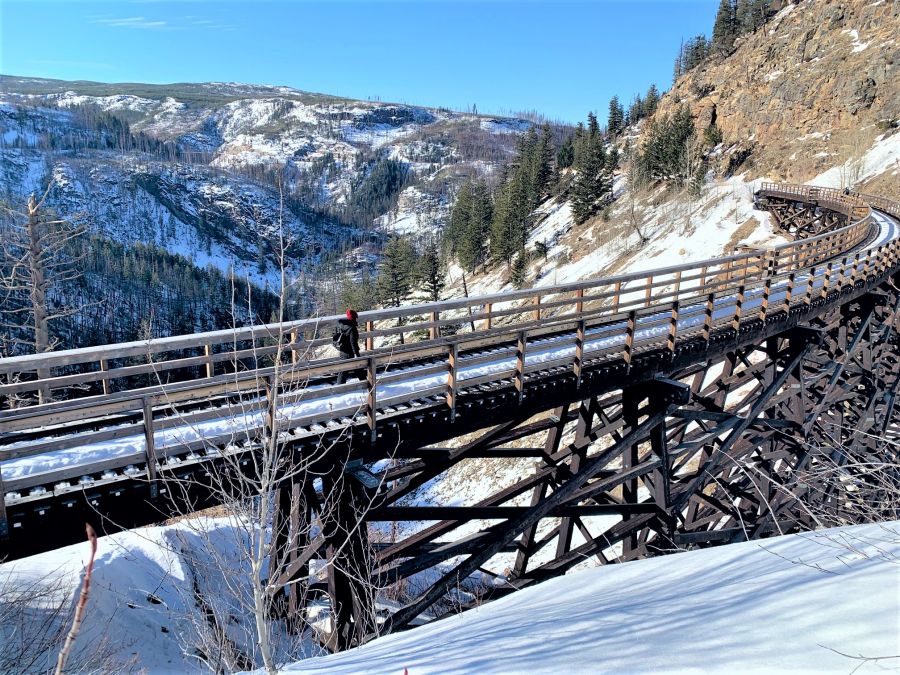 </who>The Myra Canyon hike from the Myra Forest Service Road parking lot includes a dozen trestles (bridges) like this one spanning a chasm along the canyon rim.