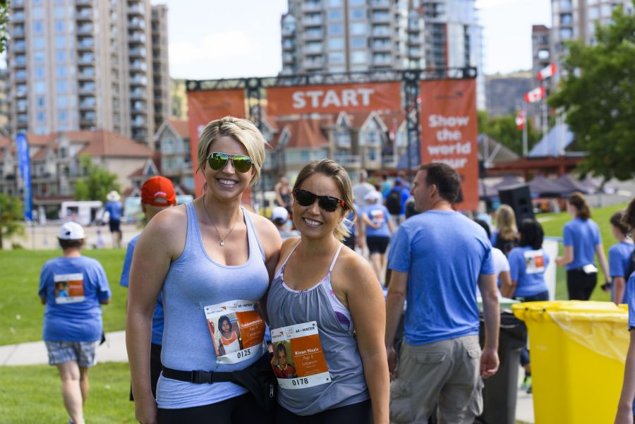 <who>Jodi Simpson, left, and Kaylyn Martin pose for a portrait at the World Vision Global 6K for Water event at Tugboat Bay in Downtown Kelowna on Sat. July 7, 2018. Simpson has sponsored a child through World Vision for more than a decade. Photo Credit: NowMedia.</who>