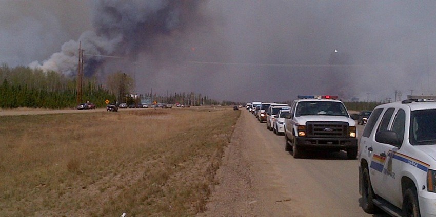300 RCMP officers are on the scene in Fort McMurray escorting people out and searching for others.
