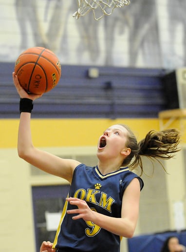 <who>Photo Credit: Lorne White/KelownaNow </who>Lily Pink lays up two of her team-leading 13 points for OKM <br>against NorKam on Friday.