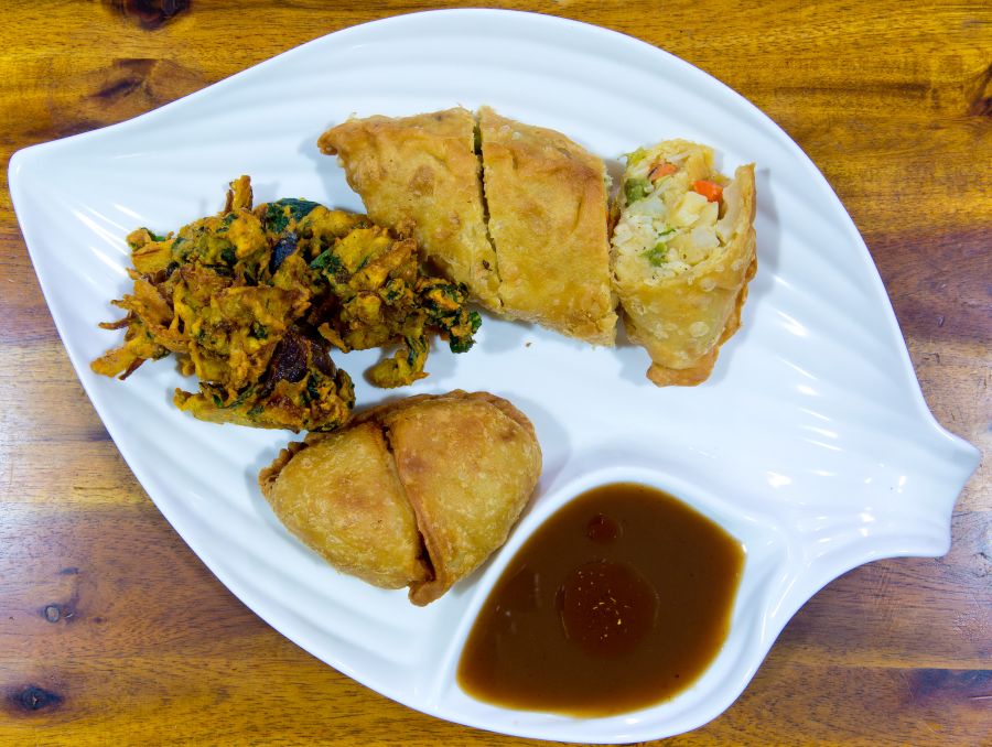 Combo (pakora, samosa, and express samosa with a tamaridn sauce).