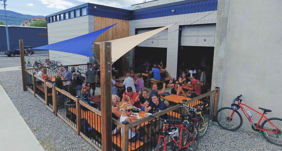 <who>Photo Credit: The Fermentation Project</who> The thoroughly packed taproom patio in pre-COVID times