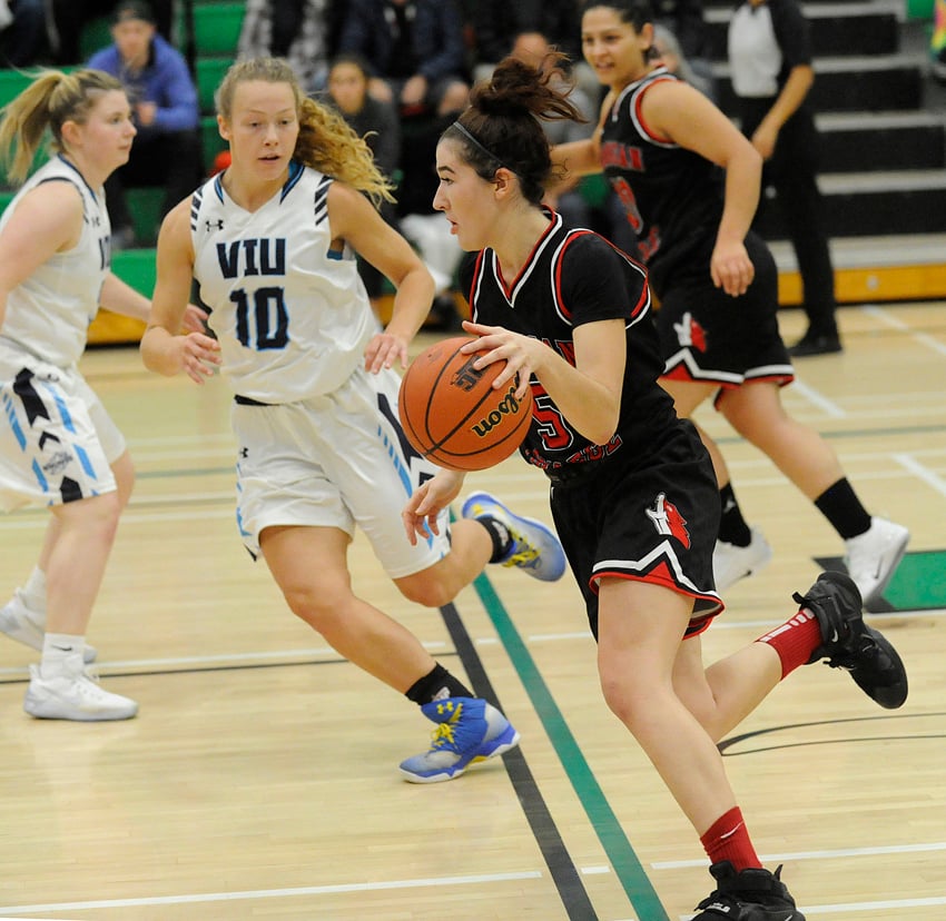 <who>Photo Credit: Lorne White/KelownaNow </who>OC's Danielle Ruocco drives toward to the hoop in Saturday's loss to Vancouver Island University.
