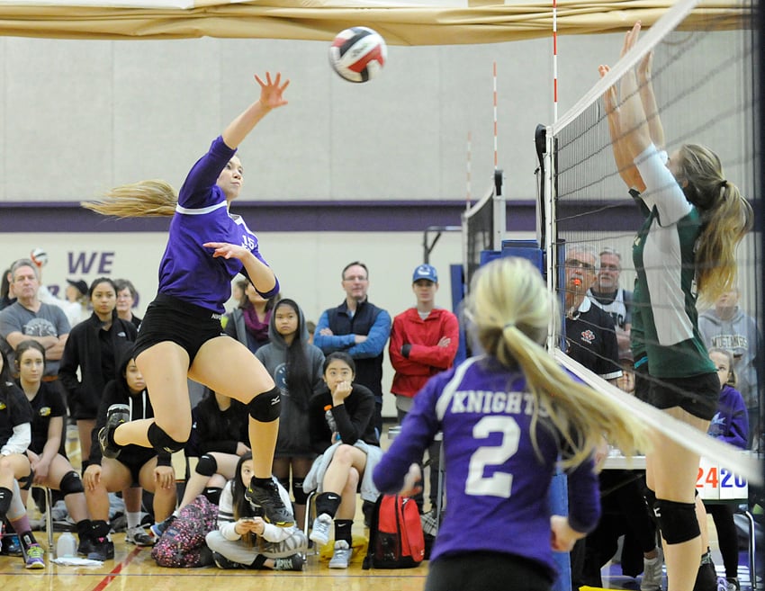 <who>Photo Credit: Lorne White/KelownaNow </who>Kara Stasiewich of the Kelowna Christian School Knights powers the ball for a point against Immaculata.