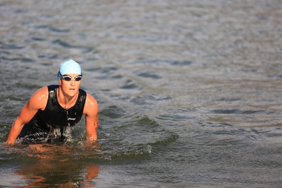 <who>Photo Credit: KelownaNow</who>Carmelle Guidi-Swan of Kelowna was third out of the water at Tugboat Bay and went on to second-place overall.