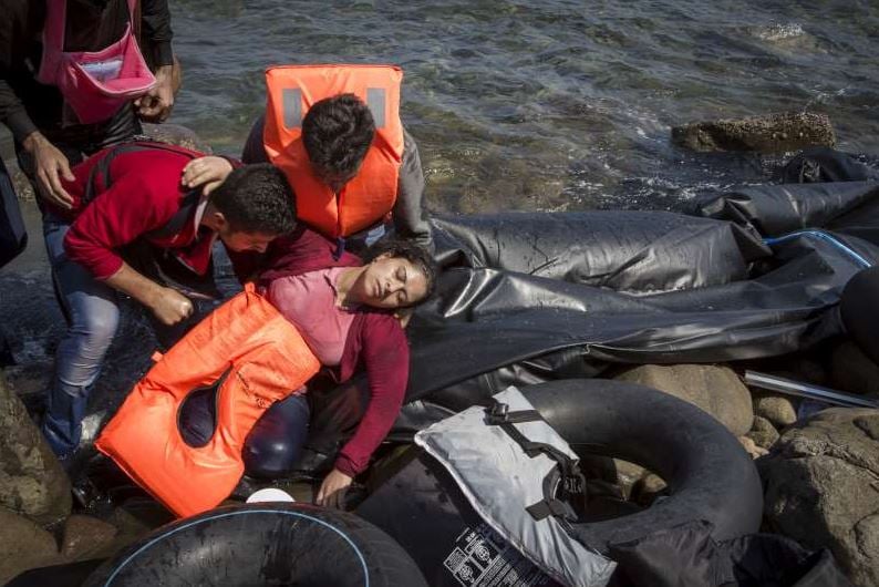 <who> Photo Credit: The UN Refugee Agency </who> Syrian refugees landing in Turkey following a horrific journey