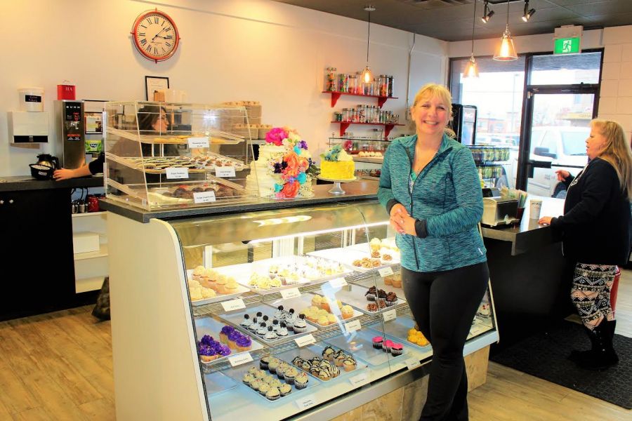 <who>Photo Credit: Micah Mazur</who>CupCasions owner, Libbie Lineker, in her store