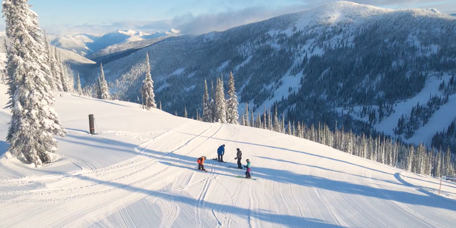 <who> Photo Credit: Stephen Malette</who>Family enjoying Whitewater Ski Resort