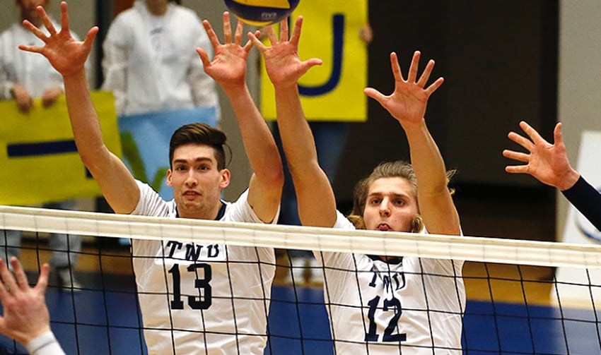 <who> Photo Credit: CIS </who>Leigh Goossen, left, is a Kelowna Christian School grad who transferred to Trinity Western last fall.