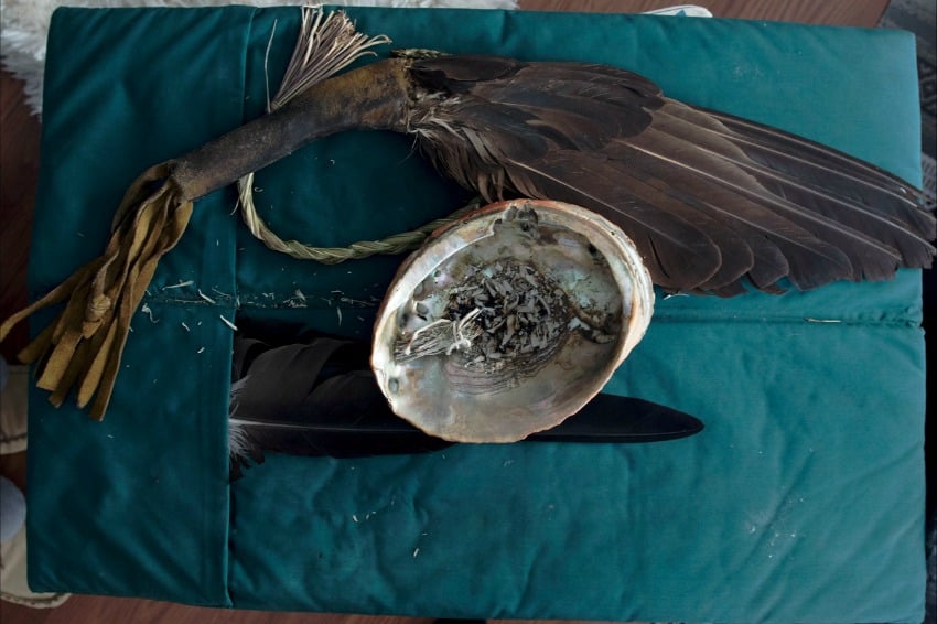 Preston B Guno, Provincial Director, Indigenous Cancer Care, B.C. Cancer Agency, sharing sacred items of traditional medicine