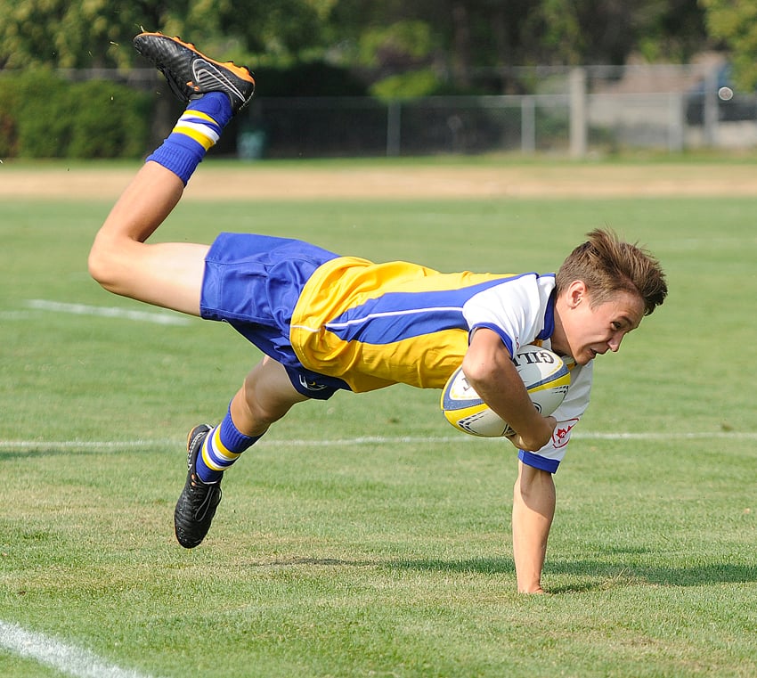 Kelowna's Lewis Jenkins upended after a long run in the BC U15s' Western Canadian opener.