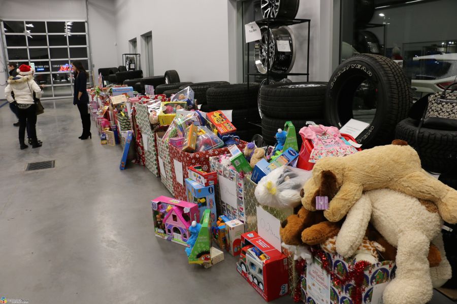 <who> Photo Credit: KelownaNow</who> Hundreds of toys and gifts were graciously donated to make Kelowna Santas possible.