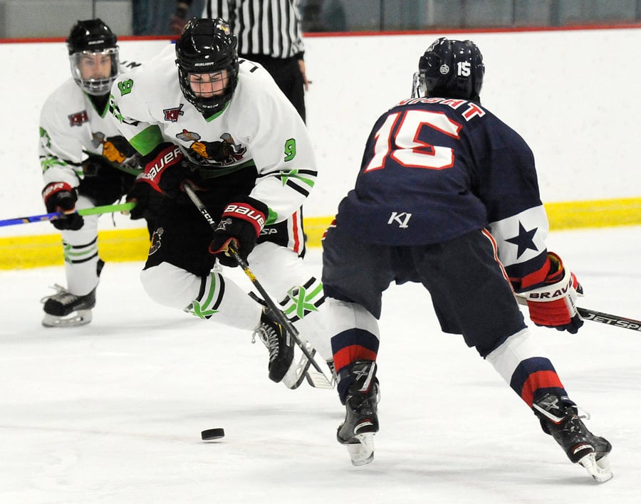 Defenceman Jordan Lowry moves the puck out of the Chiefs' zone. He earned two assists in the 11-2 victory.