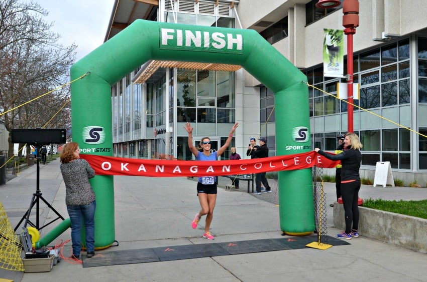 <who> Photo Credit: Okanagan College. </who> Christy Lovig was the first to cross the finish line in last year's 10K.