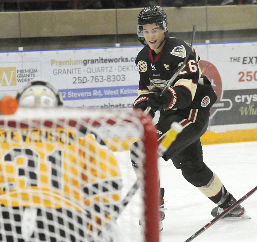 Jacob Brockman of the Warriors watches Clay Stevenson of the Express make one of his 30 saves.