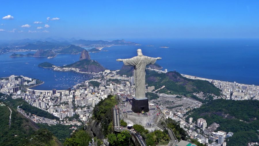 <who>Photo Credit: Wikipedia</who> The Christ the Redeemer Statue is hard to miss when visiting Rio de Janeiro!