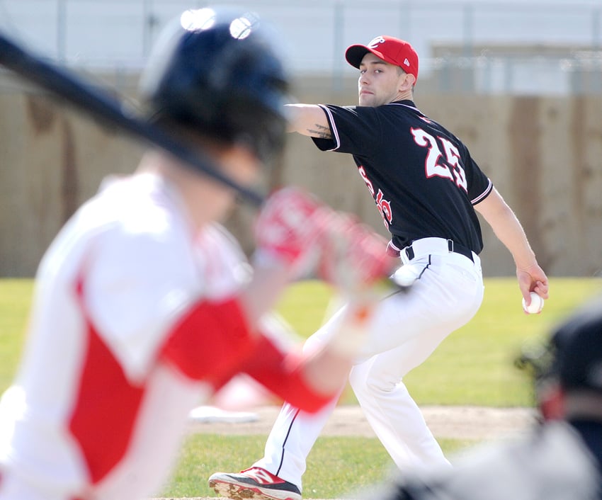 <who>Photo Credit: Lorne White/KelownaNow </who>The OC Coyotes' Zach Yandeau dominated the U of C Dinos, striking out 13 in his first win of the season.
