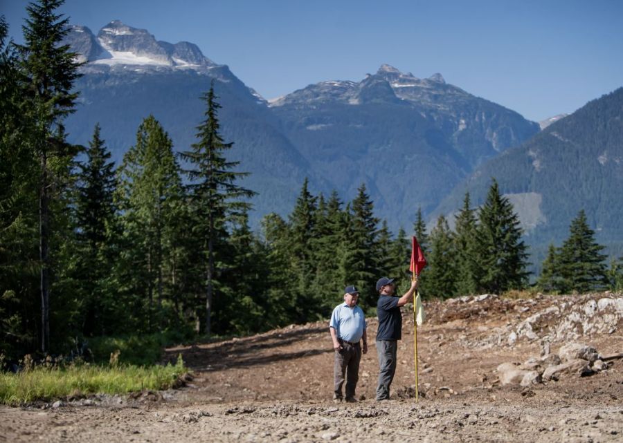 <who>Photo Credit: Cabot Revelstoke</who>Rod Whitman and his project lead Dan Philcox check out their canvas.