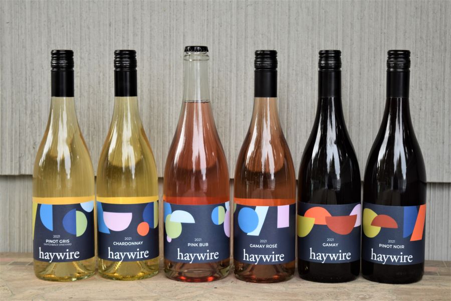 </who>Sporting sharp new labels are the 2021 line up of Haywire wines -- from left, Switchback Pinot Gris ($30), Chardonnay ($30), Pink Bub Sparkling ($30), Gamay Rose ($26), Gamay ($29) and Pinot Noir ($30).