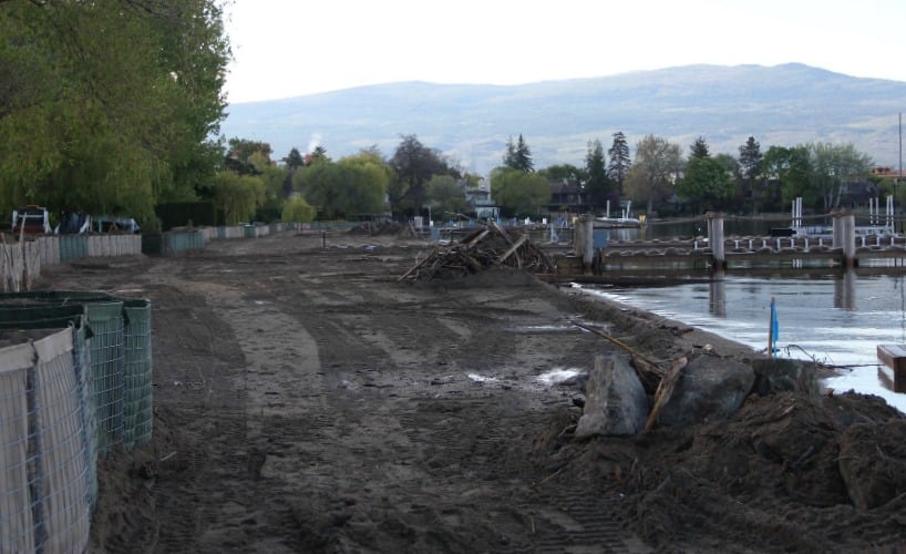 <who> Photo Credit: KelownaNow </who> Shorelines of Okanagan Lake have risen significantly over the past month.