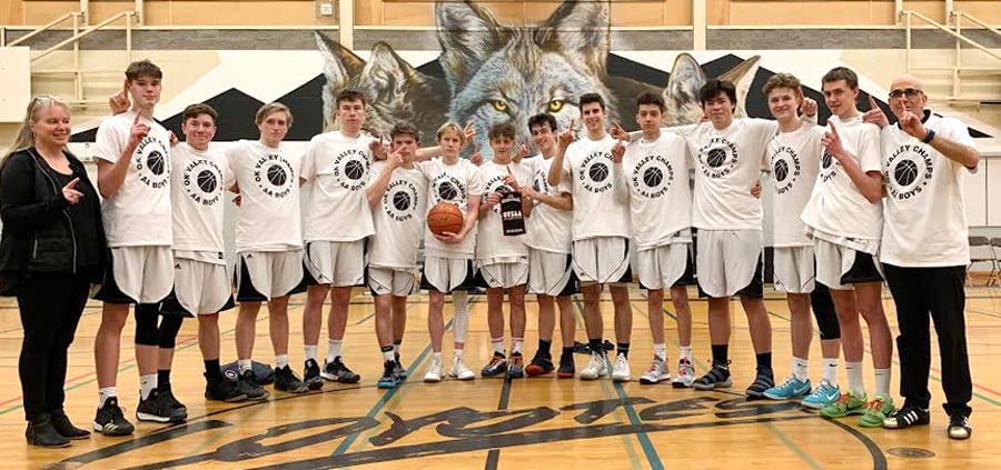 <who>Photo Credit: Contributed </who>The George Elliot Coyotes won three straight games to win the Okanagan Valley senior AA boys basketball championship on home court during the weekend. Members of the 2018-19 Lake Country team are, from left, front: Kathy Lafontaine (coach), Bergrin Van Lent, Brandon Frechette, Nic Lafontaine, Roan McCarthy, Jaeden Lever, Ben Hitchens, David Ley, Matt Darley, Khayden Culic, Carter McConnell, Chris Auger, Triston Hearn, Peter Blades and David Lafontaine (coach).