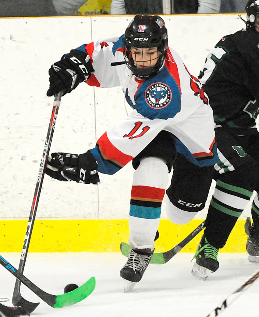 <who>Photo Credit: Lorne White/KelownaNow </who>Lynden Lakovic finds space in tight quarters against Nanaimo.
