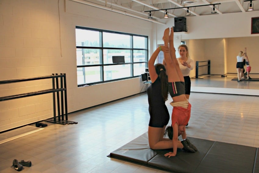 Students at Deschner's Dance Force trying acrobatics for the first time on Monday night.