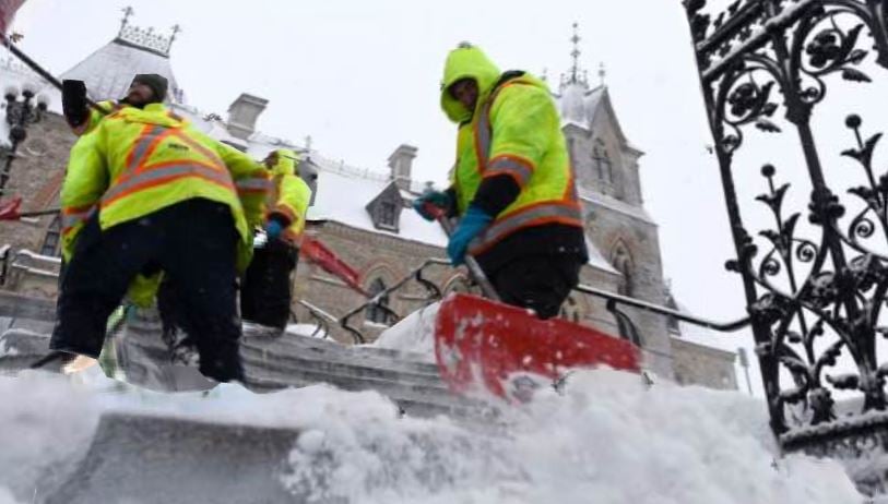 </who>This photo from the Freedom Convoy Facebook page shows truckers shovelling snow around Parliament Hill.
