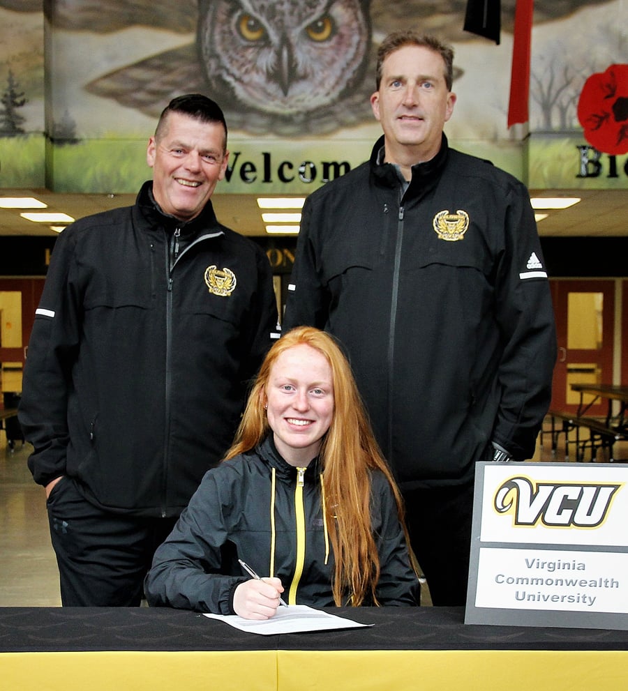 <who>Photo Credit: Contributed </who>Joining McKinney for her official signing with Virginia Commonweatlh University are KSS coaches Arnar Bernhardsson, left, and Brian DeMug.