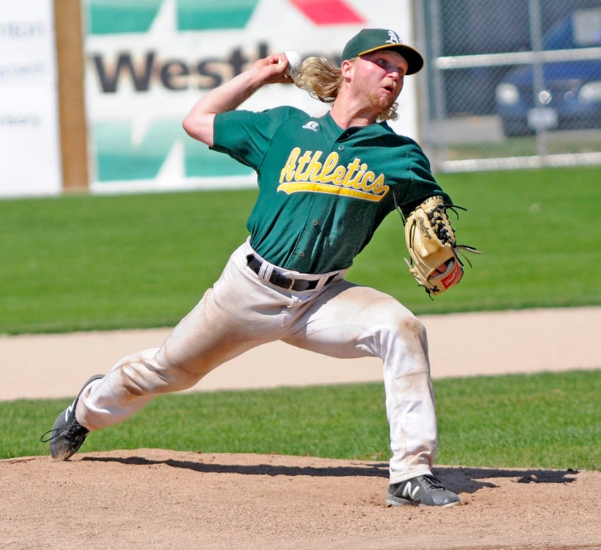 <who>Photo Credit: Lorne White/KelownaNow </who>Keaton Mandryk delivers a pitch in the Okanagan Athletics’ 8-7 come-from-behind BCPBL win on Sunday at Elks Stadium.