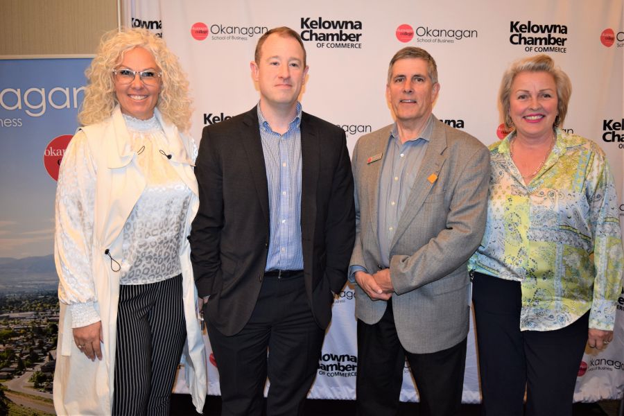 </who>BC Real Estate Association chief economist Brendon Ogmundson, second from left, was the guest speaker at today's Kelowna Chamber of Commerce lunch at the Ramada Hotel. He's joined here by Association of Interior Realtors past-president Kim Heizmann, left, Bill Gillett of Okanagan College and Paula Quinn from KF Aerospace, who is also on the chamber board of directors.