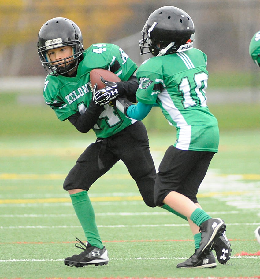 <who>Photo Credit: Lorne White/KelownaNow </who>Brady Schutz, left, of the Kelowna Riders was selected as the BCCFA's most valuable player at the provincial atom championship tournament while quarterback Quinn Kayfish also made a significant contribution to the Riders' provincial title.