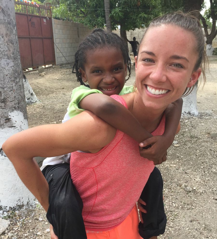 <who> Submitted </who> Brandy having fun with the locals during her volunteer work in Haiti over the summer.