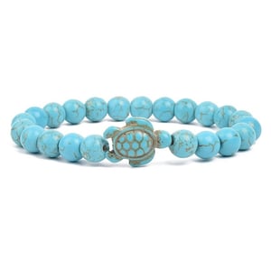 Bracciale in turchese con tartaruga.