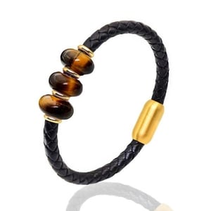"Bracciale in pelle con 3 perle di occhio di tigre".