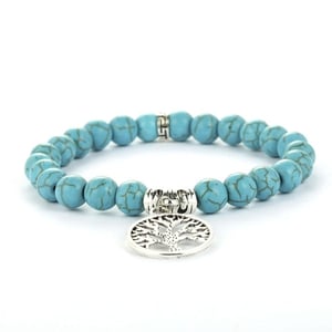 Bracciale in turchese con motivo dell'Albero della Vita.