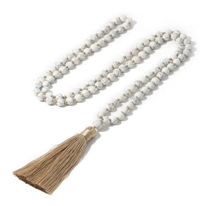 "Collana di 108 pietre mantra buddiste di howlite.
