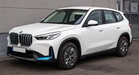 BMW iX1 xDrive30 — Storm Bay metallic
