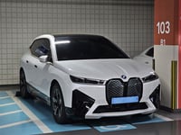 BMW iX xDrive50 — Oxide Grey metallic