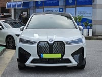 BMW iX xDrive50 — Storm Bay metallic