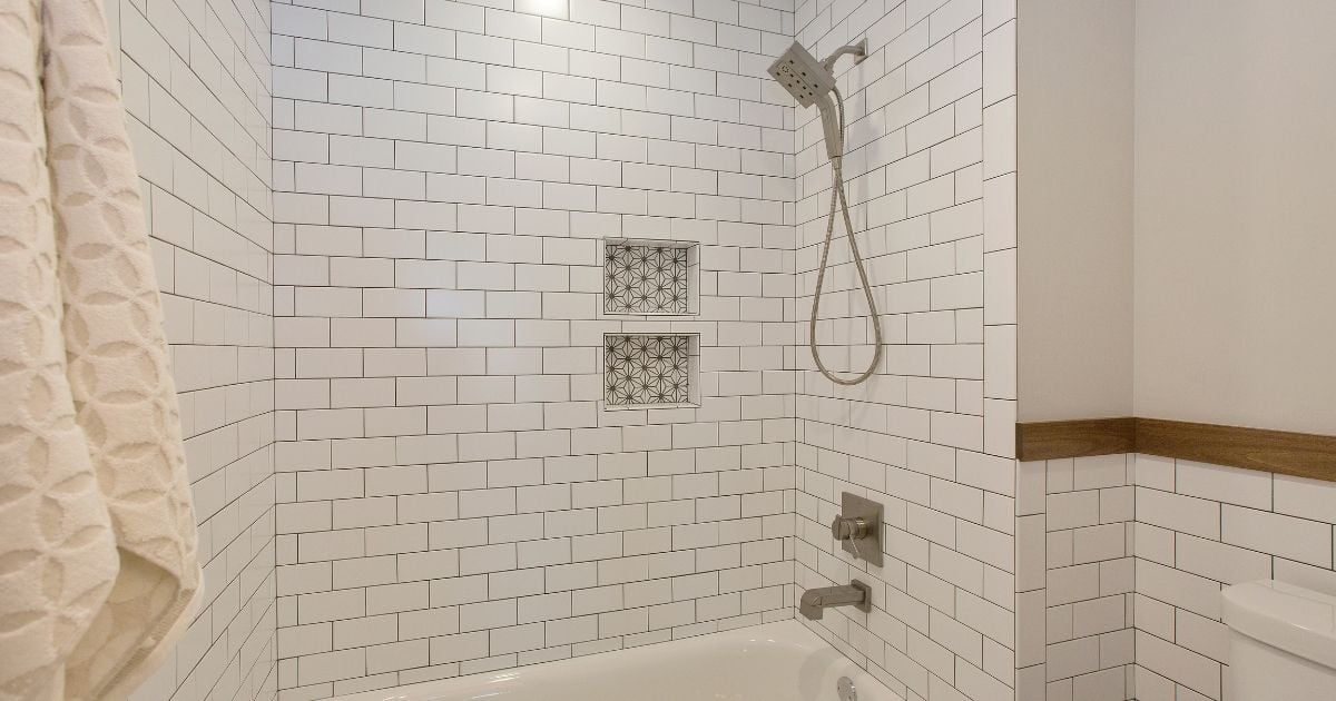 Subway tile is a clean and simple look that makes a shower feel bigger