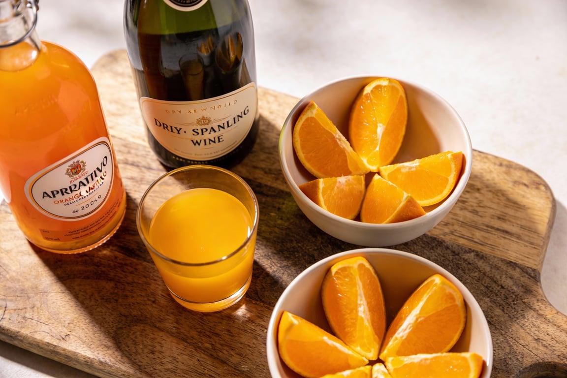 Stretching Aperol with orange juice for affordable party drinks