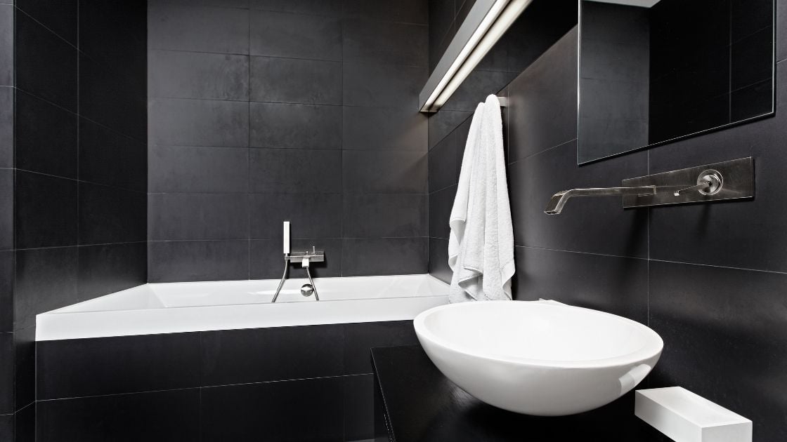 Balance between black and white in this bathroom