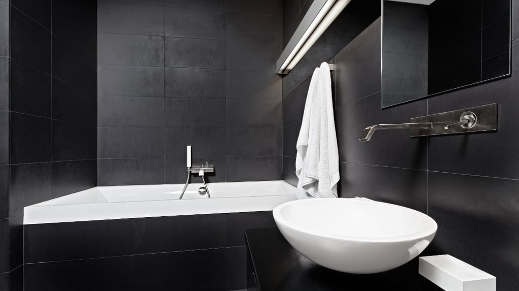 Balance between black and white in this bathroom