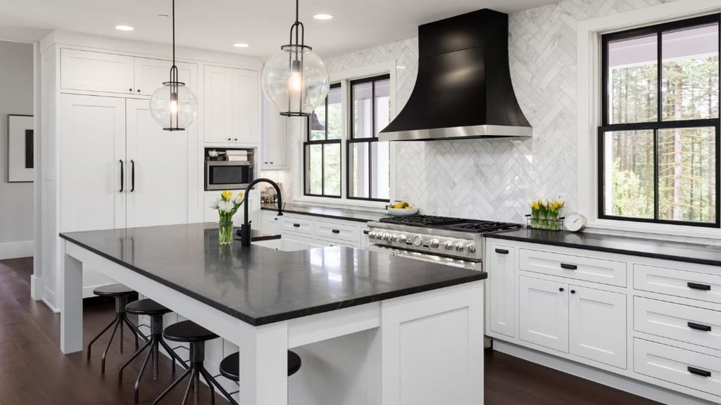 White Kitchen Black Counter and Island