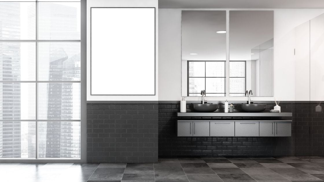 Gray bathroom looking over city skyline